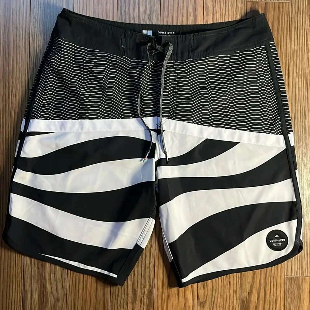 Men’s Quicksilver swim trunks size 33